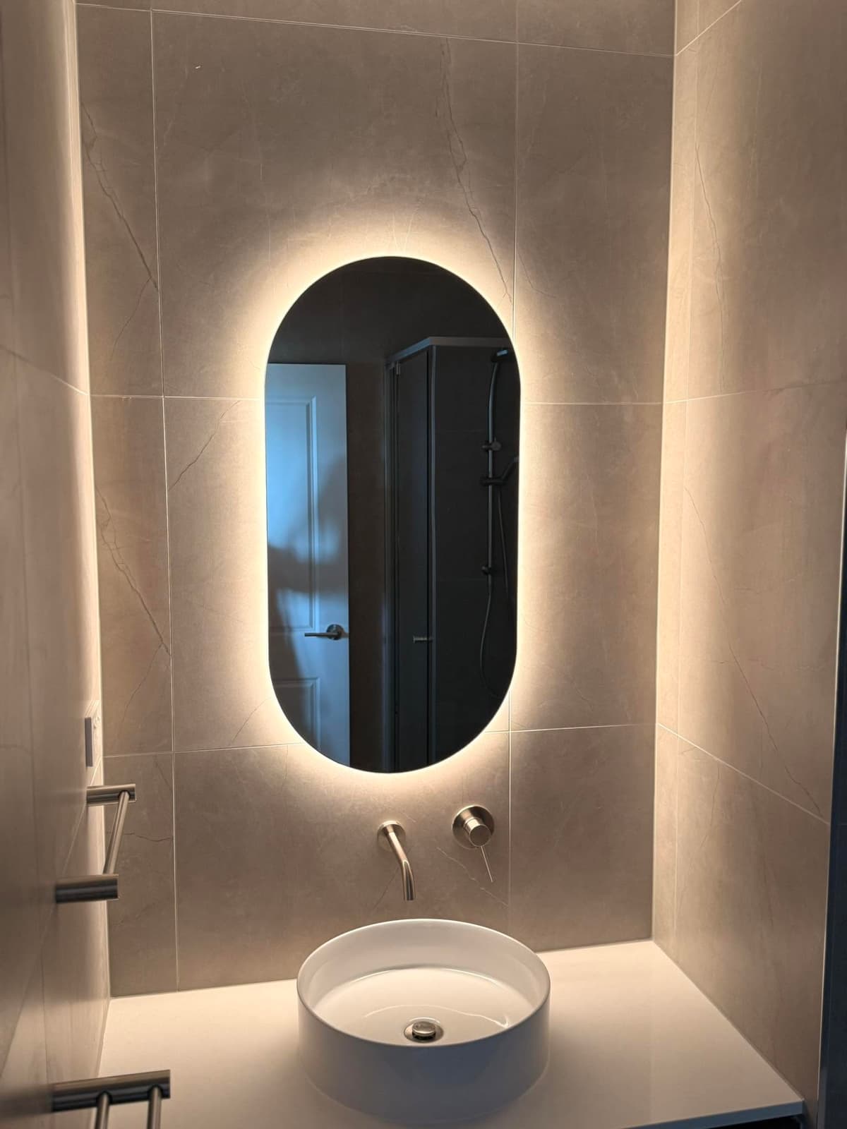 Backlit LED bathroom mirror installed by Wattify Electrical